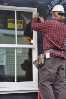 Man fixing a window